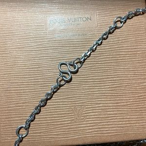 28” silver toned #9 necklace